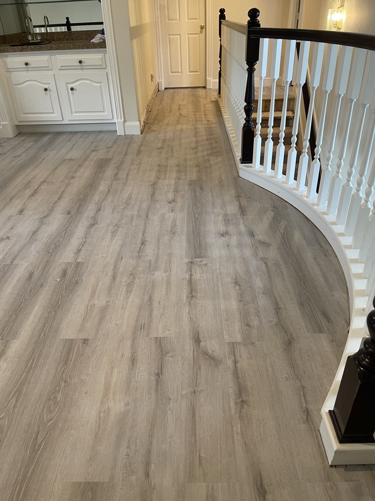 Gray LVP flooring installation